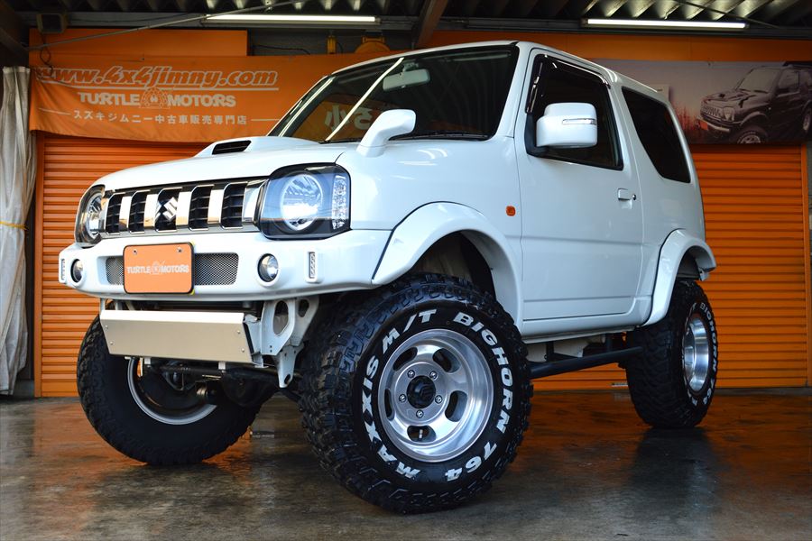 平成２３年式ＪＢ２３Ｗ８型クロスアドベンチャーＸＣのカスタム車が入庫しました。パールホワイトのオートマチック車です。